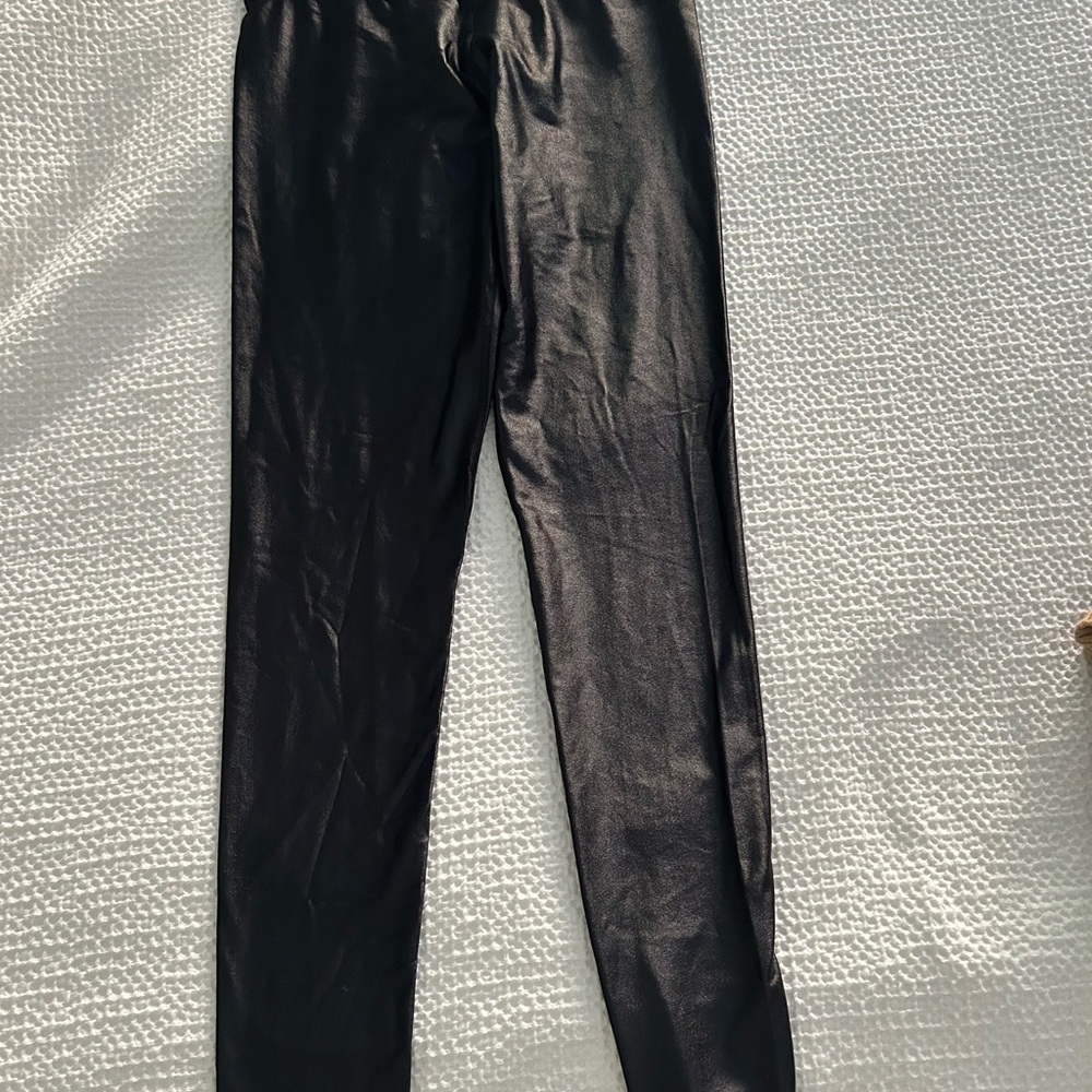 Shiny woman’s leggings